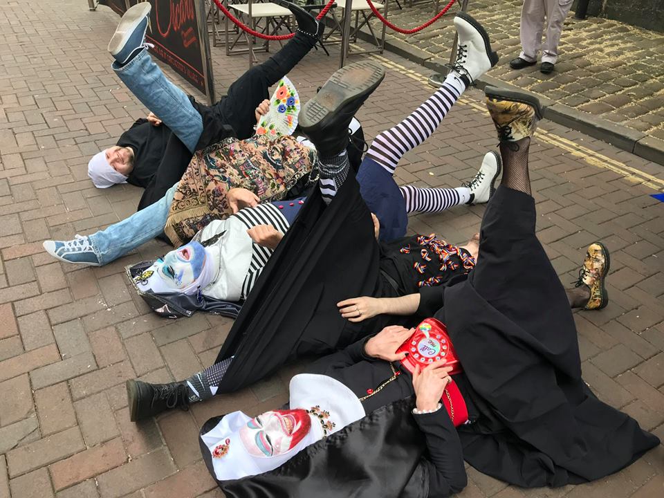 Legs in the air to bless Canal Street!